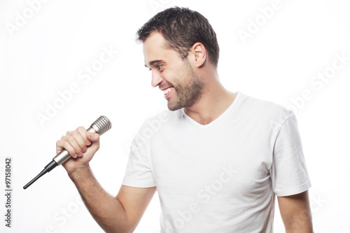 young man holding a microphone