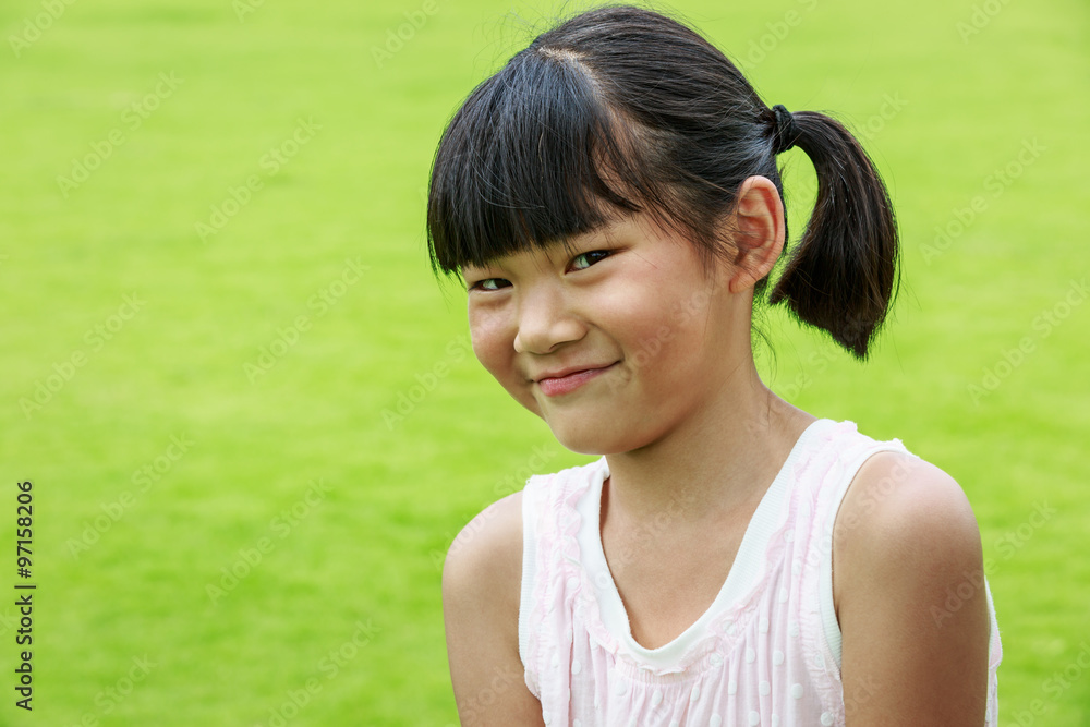 A happy Oriental little girl lovely expression