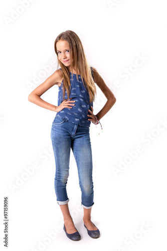 Young girl posing in jeans