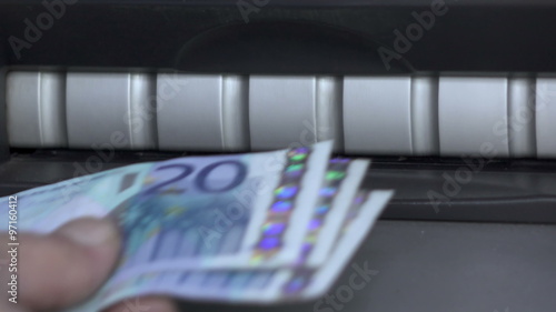 Atm machine cash withdrawal 20 euro bills,cash limit,capital controls photo