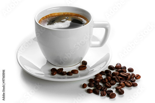 A cup of tasty drink and scattered coffee grains, isolated on white