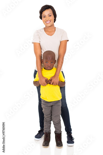 african mother and son standing together