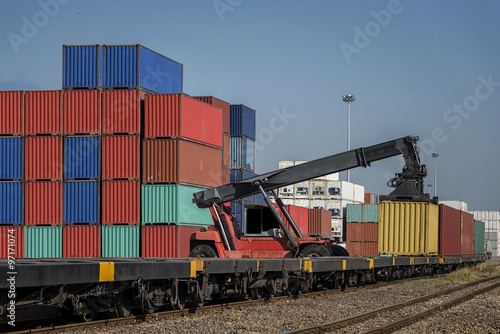 Industrial Container Cargo with working crane to railway transportation to habour in Logistic Import Export area