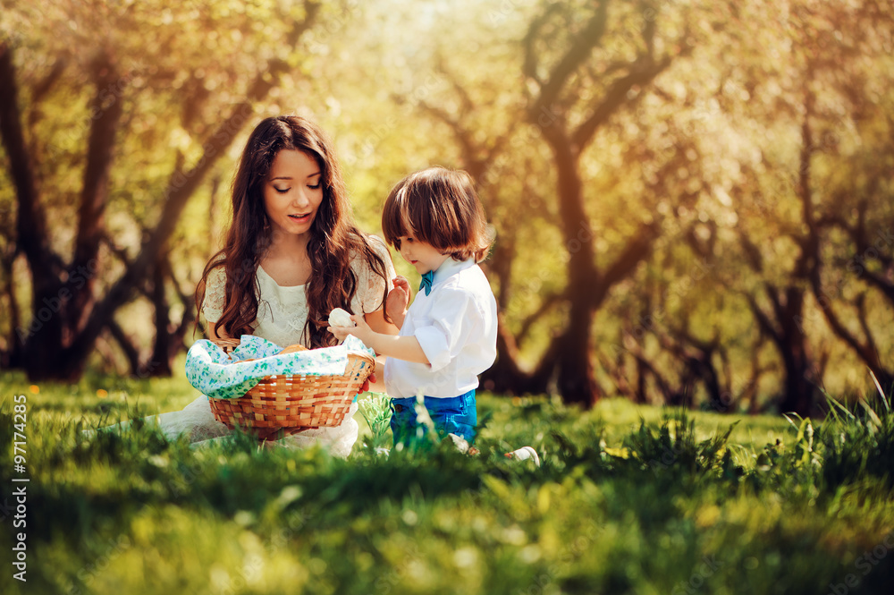 happy loving mother and toddler son eating sweets on cozy summer happy loving mother and toddler son eating sweets on cozy summer