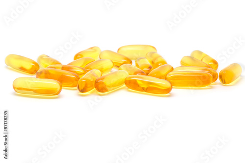 Oil in soft gelatin capsule on white background