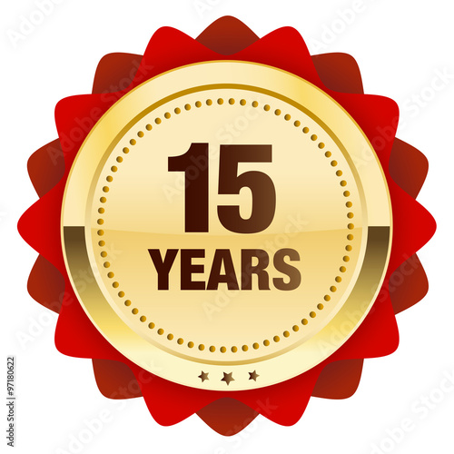 15 years seal or icon. Glossy golden seal or button with stars and red color.