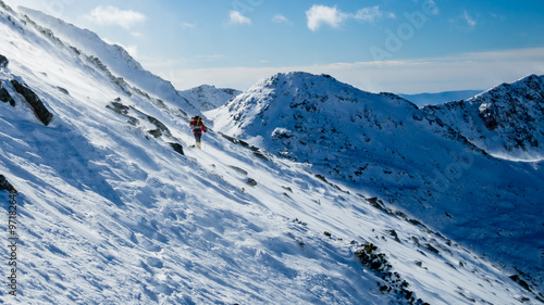 Fototapeta Naklejka Na Ścianę i Meble -  Trekking in a high winter mountain.