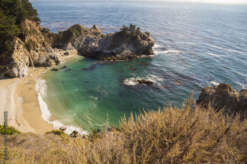 View on bay with waterfall at Big Sur, California