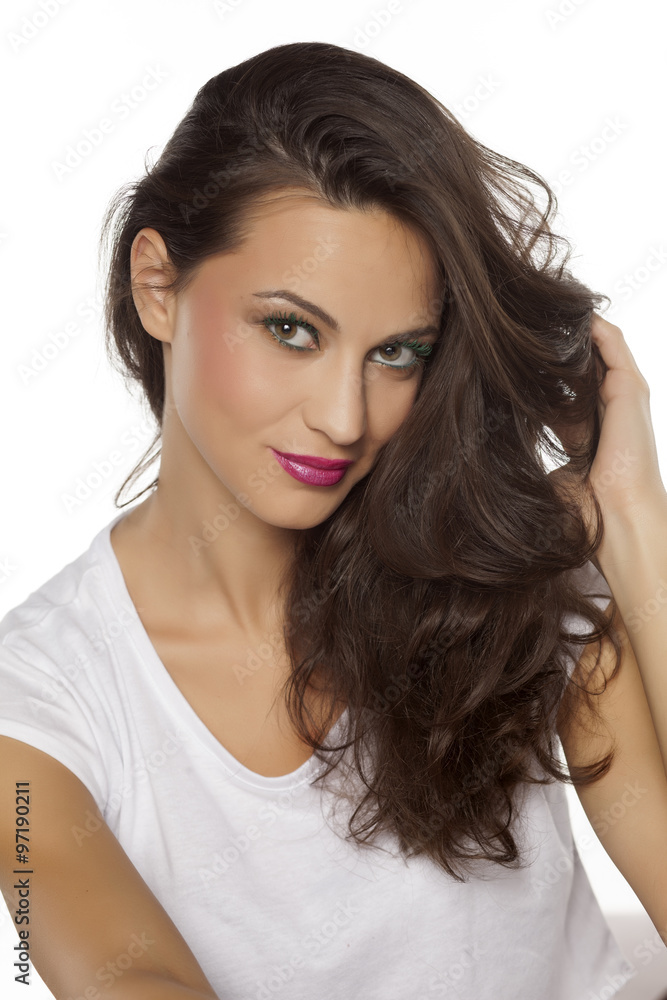 smiling beautiful young woman on a white background smiling beautiful young woman on a white background