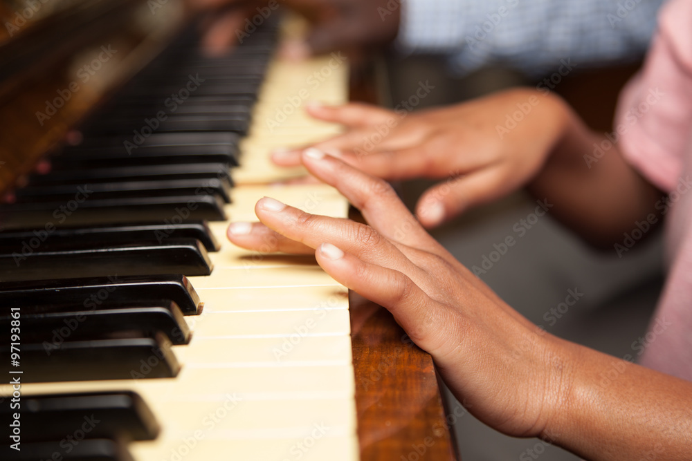 Girl learning play piano with her dad Girl learning play piano with her dad