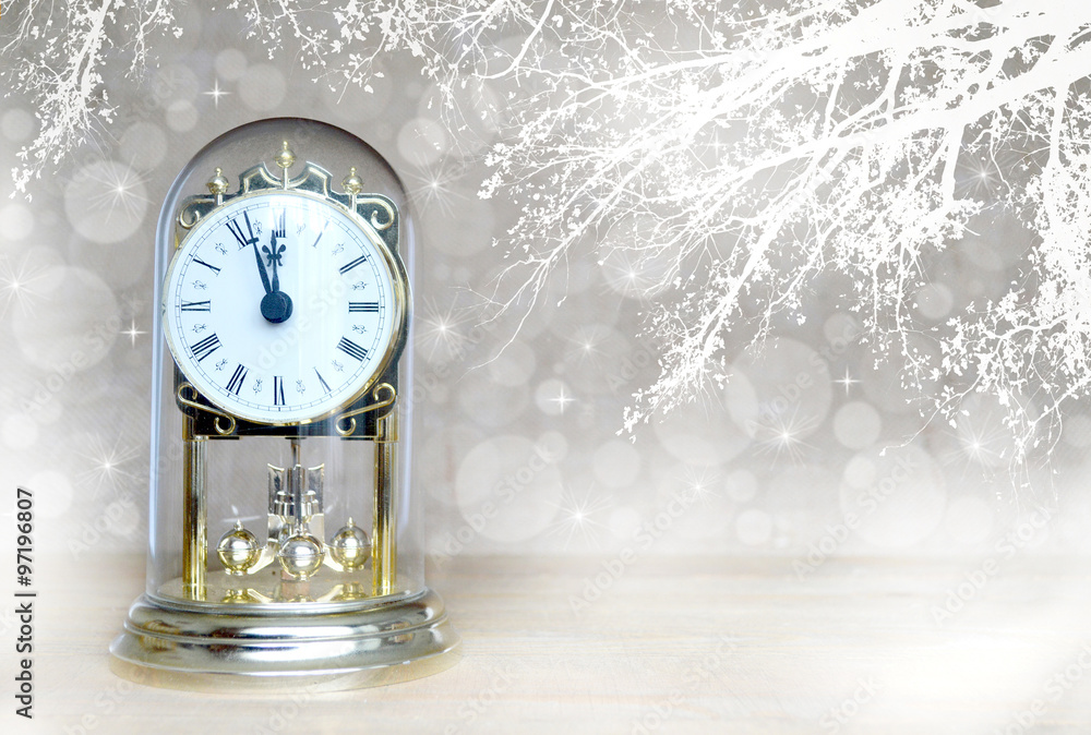 Happy New Year: Antique clock striking midnight Happy New Year: Antique clock striking midnight