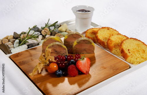Foie gras with berries and toasts to a holiday table