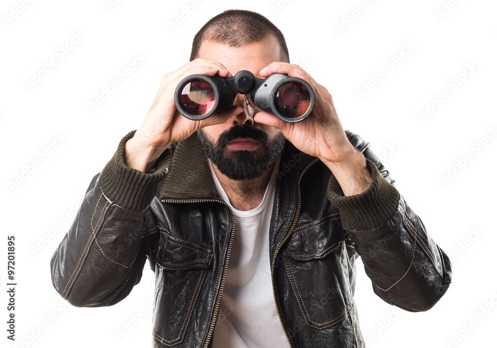 Man wearing a leather jacket with binoculars Man wearing a leather jacket with binoculars