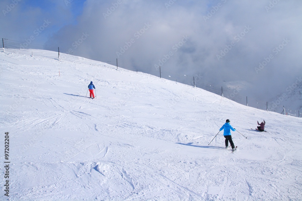 Skiers on ski resort Krvavec in Slovenian Alps