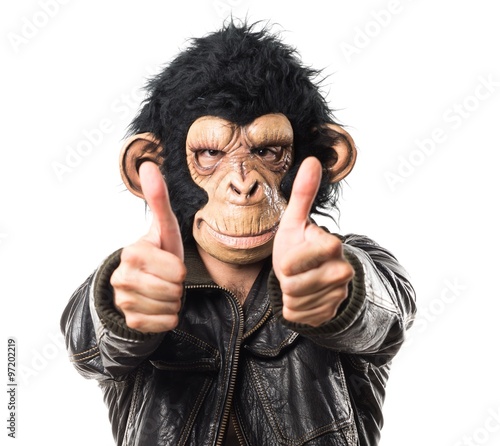 Monkey man doing victory gesture © luismolinero