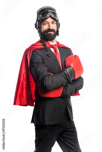 Super hero businessman with boxing gloves