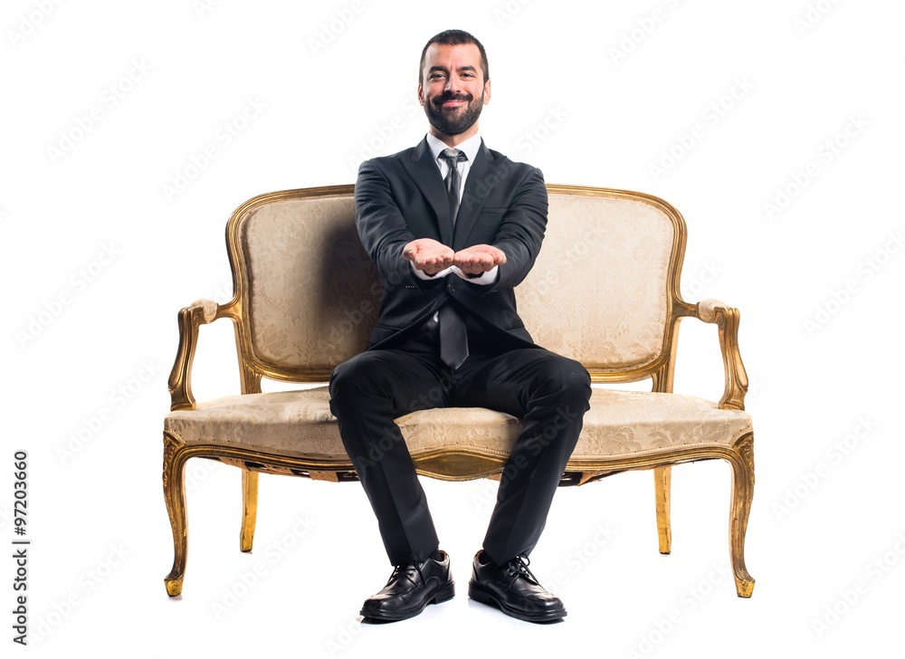 Businessman holding something Businessman holding something