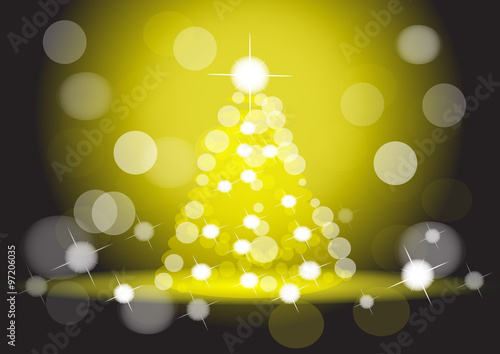 Yellow Christmas tree background. Blur, bokeh.