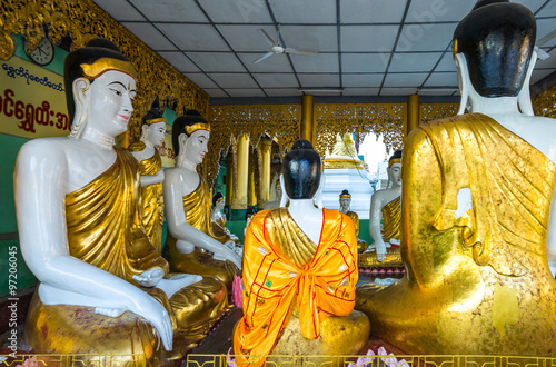 Myanmar, Yangon, Buddha statues in the Swedagon Pagoda.