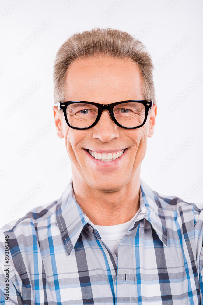 Handsome happy aged man in glasses