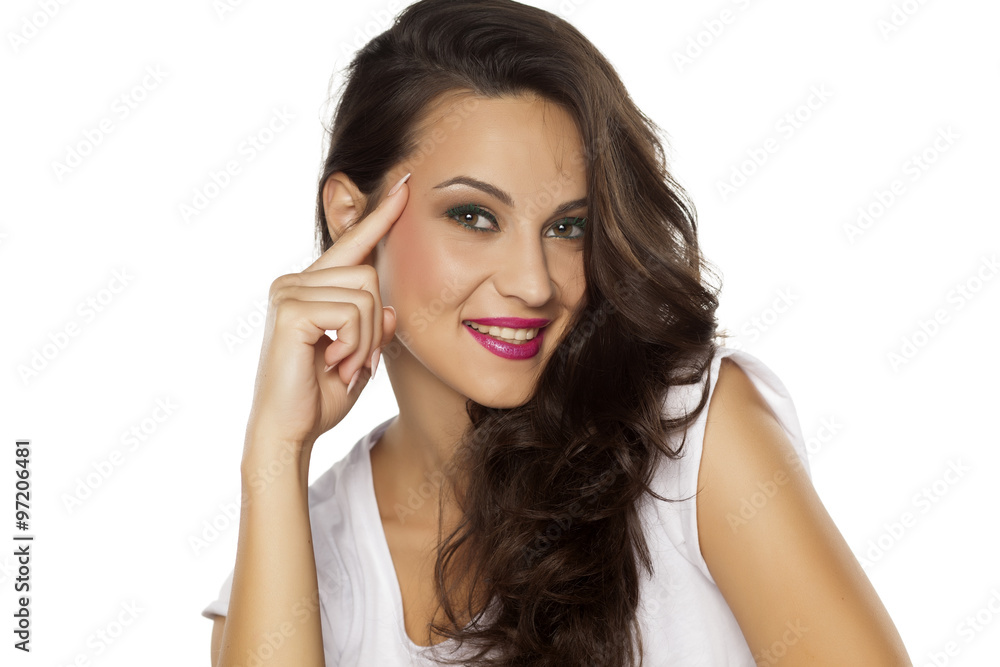 beautiful smart young woman touching her forehead beautiful smart young woman touching her forehead