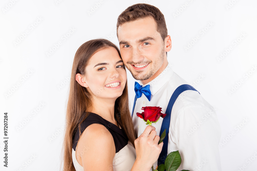 Happy cute couple in love on the date embracing each other with Happy cute couple in love on the date embracing each other with