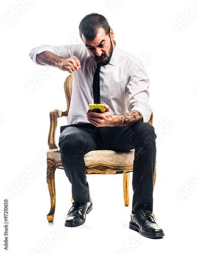 Businessman talking to mobile