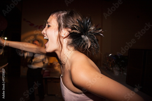 Woman smiling dancer having fun during disco party