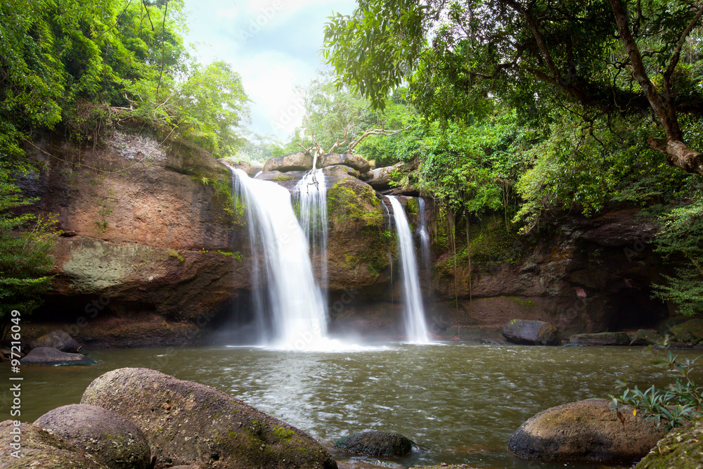 Fototapeta premium Natural water fall flare in the forest mountain.