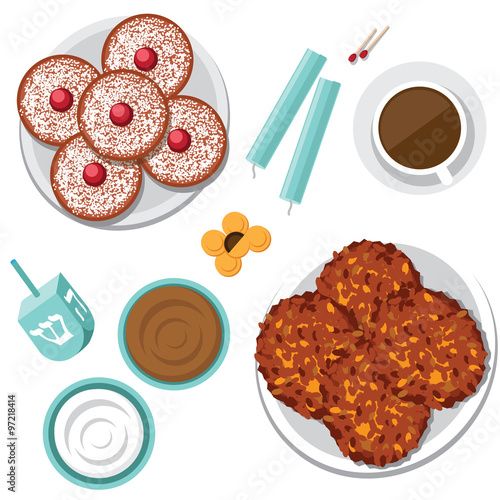 Bird's eye view of Jewish holiday Hanukkah items menorah candles, donuts, dreidel, potato pancakes (latkes), applesauce, gelt (chocolate coins) and sour cream.