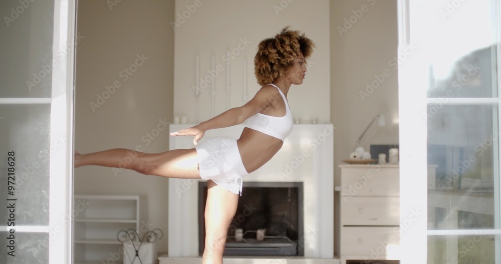 Woman Stretching On Exercise Mat At Home Woman Stretching On Exercise Mat At Home