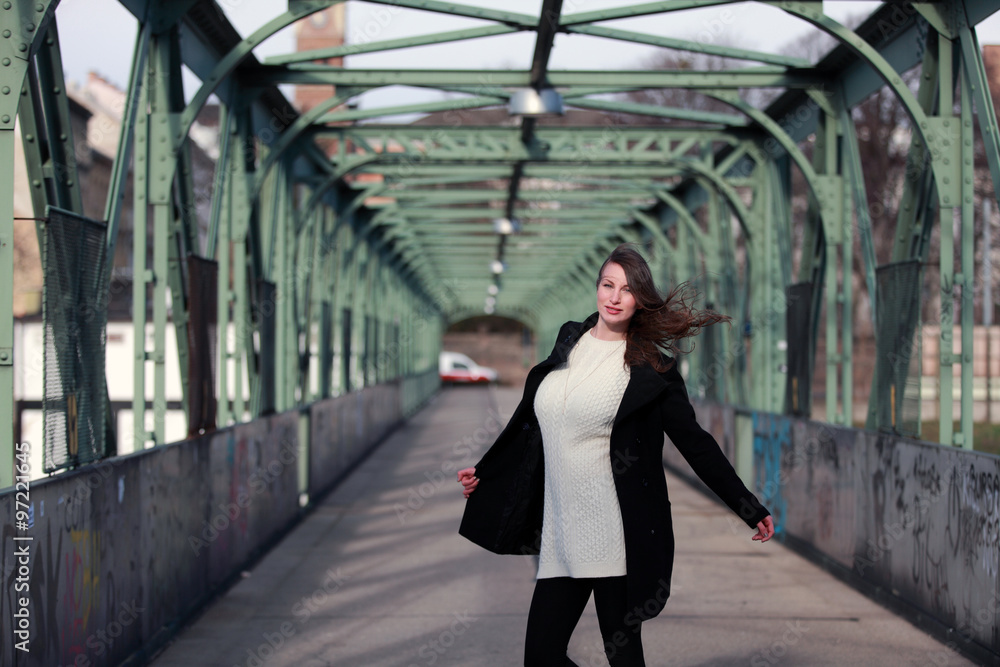 Beautiful brunette woman on the street