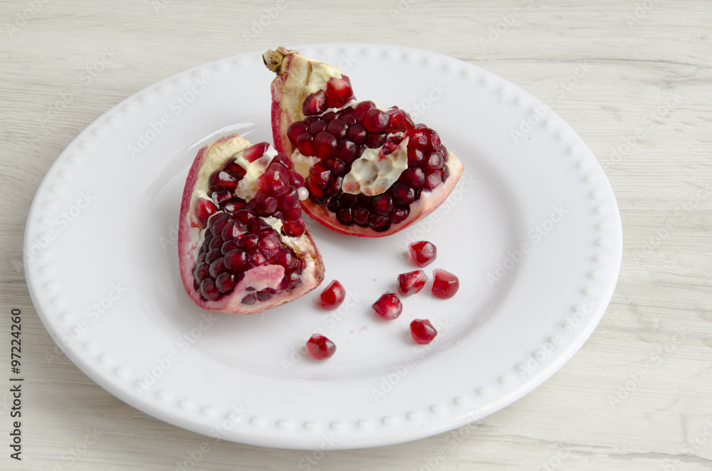 Pomegranate on a plate Pomegranate on a plate