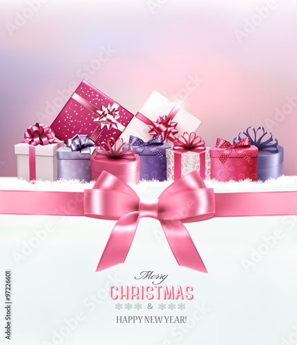 Merry Christmas card with a ribbon and gift boxes. Vector.