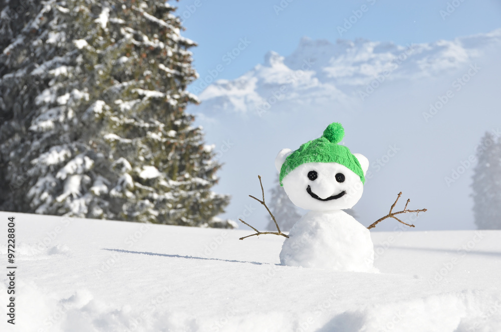 Snowman against Alpine scenery