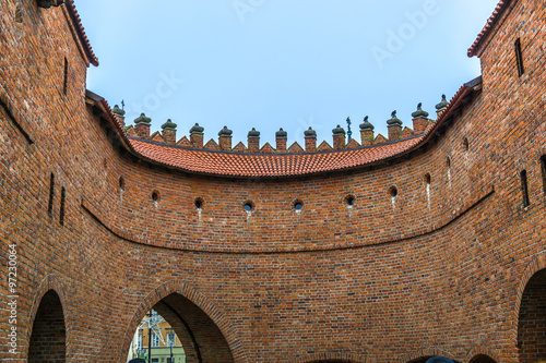 Barbican fortress in the historic center of Warsaw. Poland. #97230064