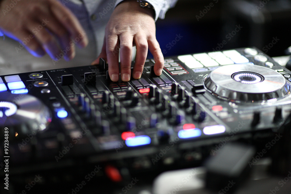 Hands of a dj performing Hands of a dj performing
