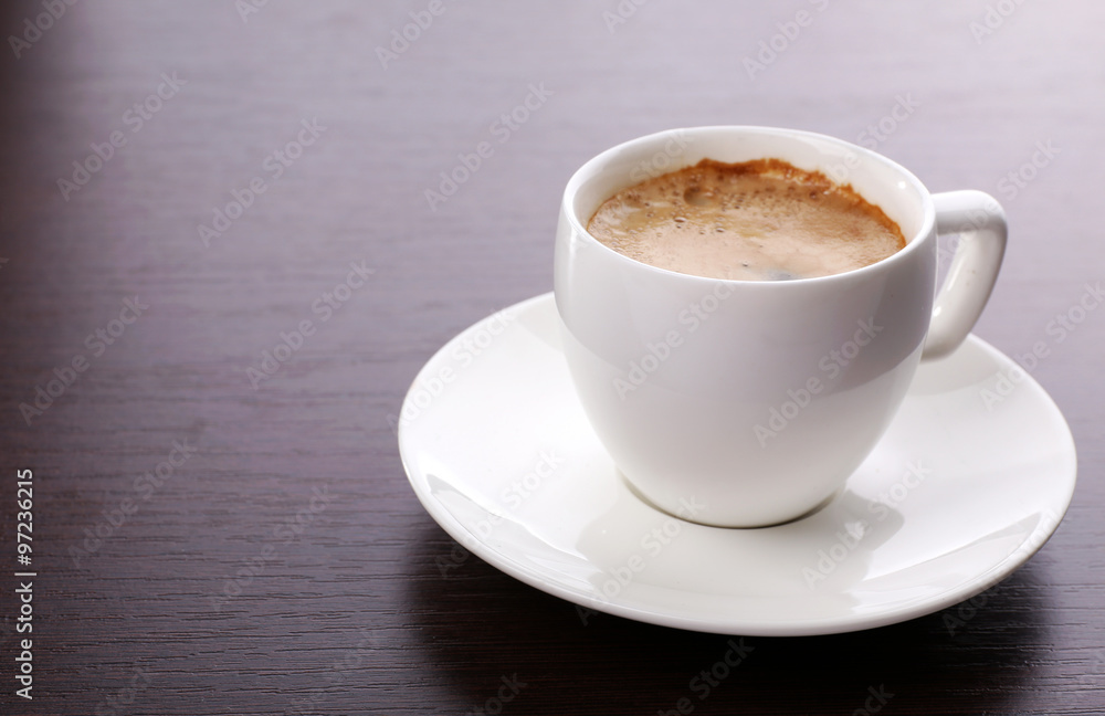 Cup of coffee on table close up Cup of coffee on table close up