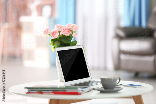 Comfortable workplace at home with laptop