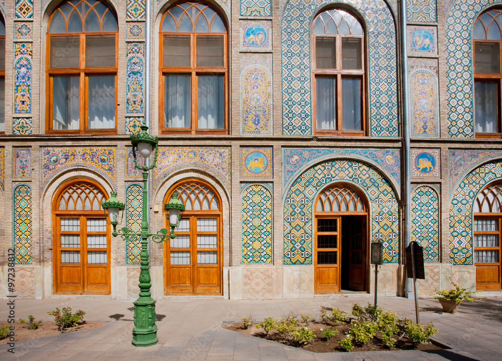 Patterned walls and wooden doors of the royal palace Golestan in Tehran, Iran.