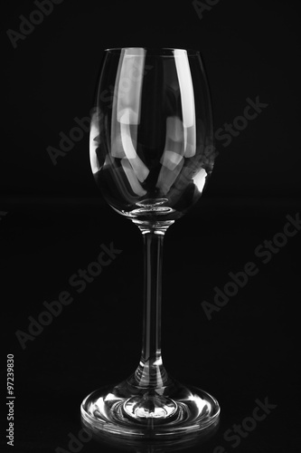 Empty glass on black background