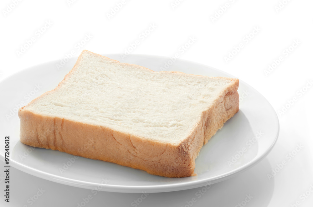 Sliced bread/Sliced bread on white plate.