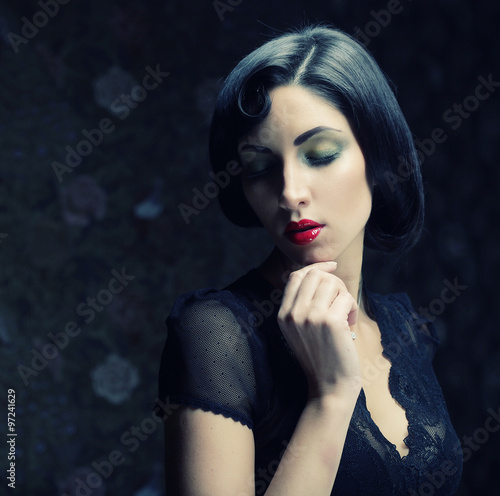 Fashion woman portrait. Beauty girl with black hair.