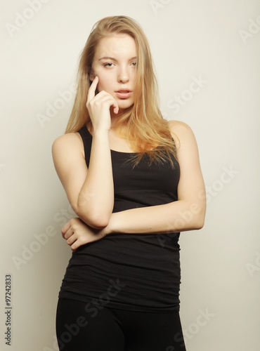 Beautiful woman with long blond hair. Fashion model posing at st © Raisa Kanareva