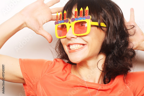 happy woman with big orange sunglasses