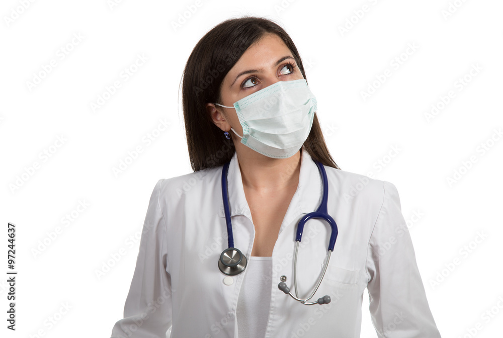 Portrait of young female doctor with mask