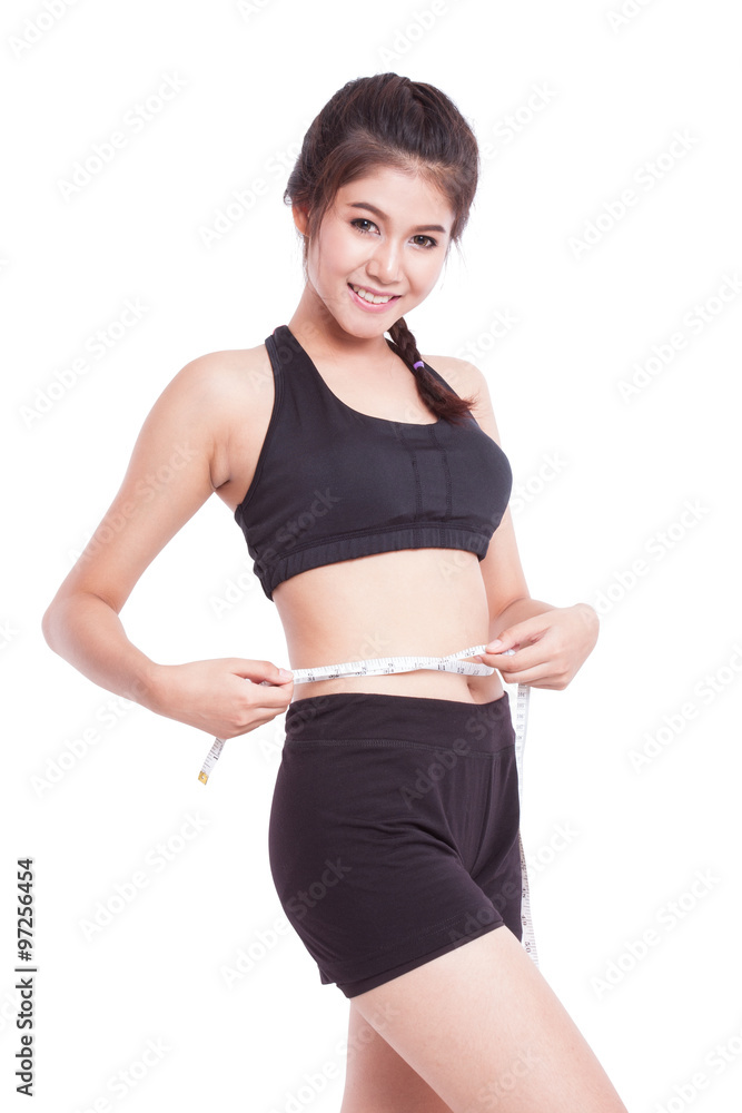 Fitness young woman taking measurements of her body. healthy concept Fitness young woman taking measurements of her body. healthy concept