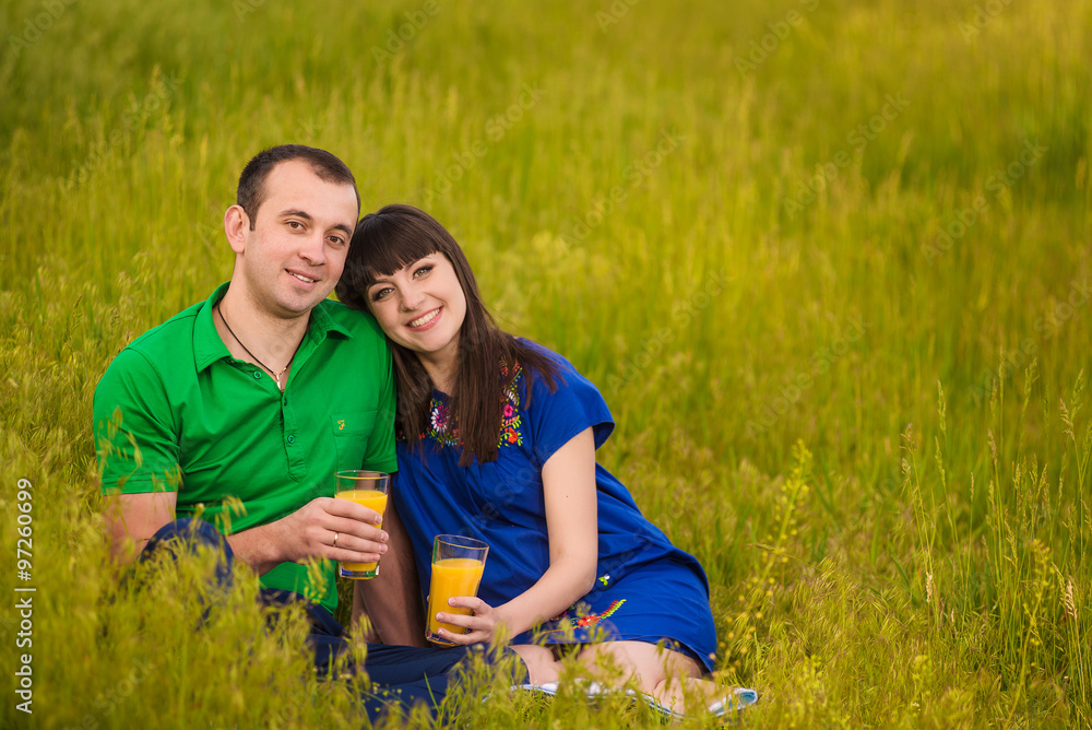 Pregnant Couple drinking juice Pregnant Couple drinking juice