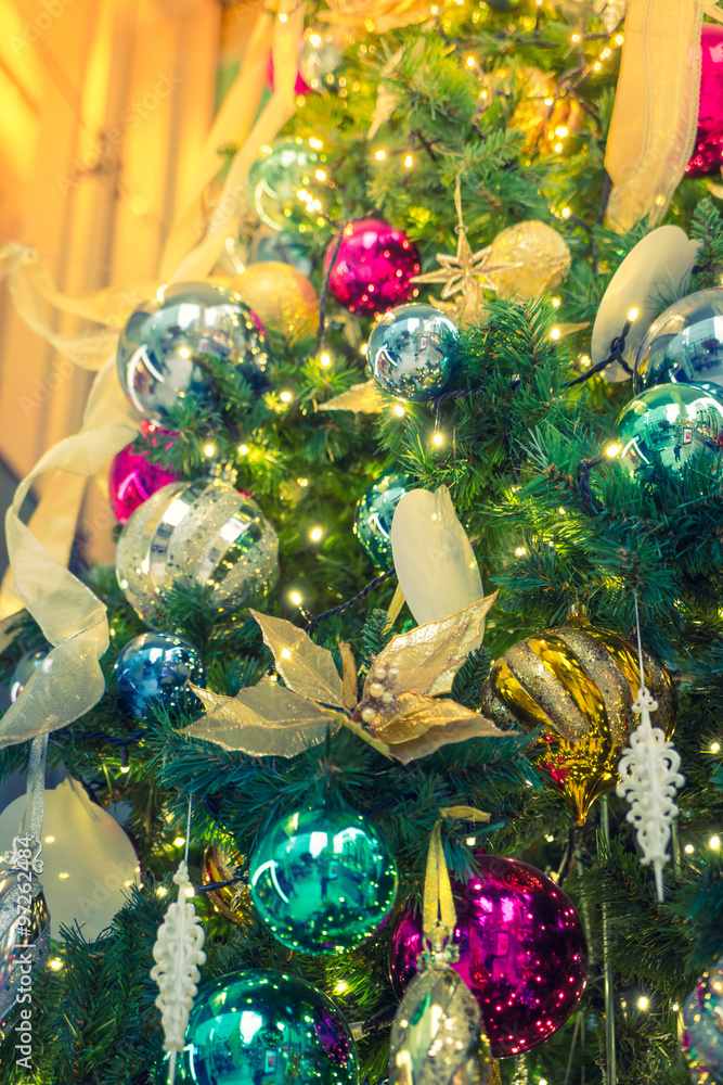 Closeup of Christmas tree decorations background ( Filtered imag