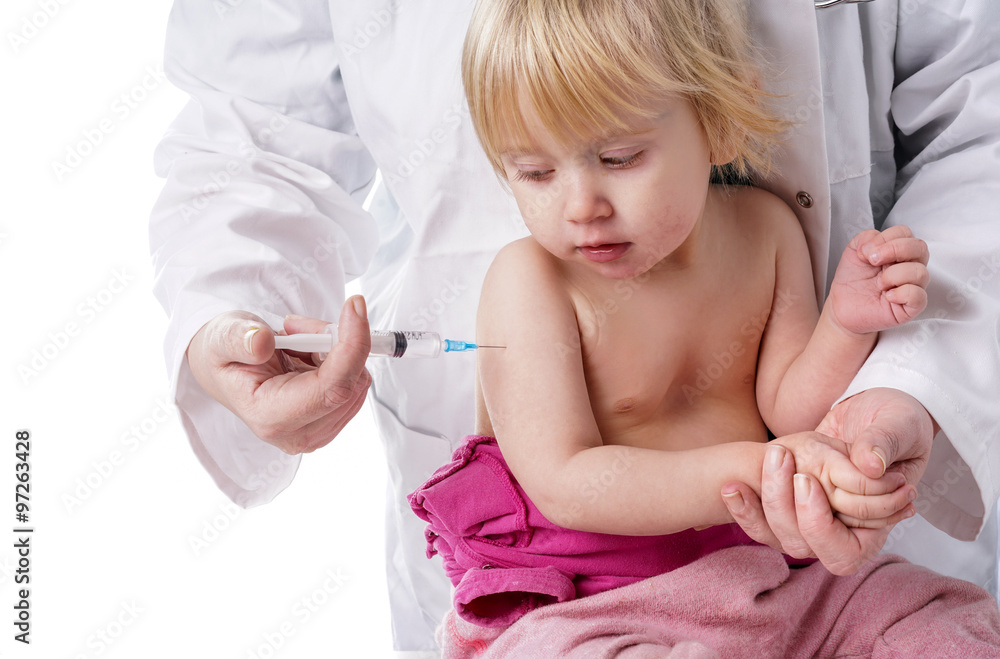 Doctor gives baby girl an injection Doctor gives baby girl an injection